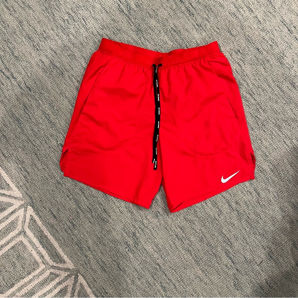 Women’s Nike red running shorts
